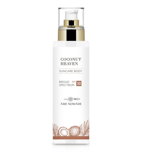 a bottle of ame nomade coconut heaven spf30 sun screen cream for body