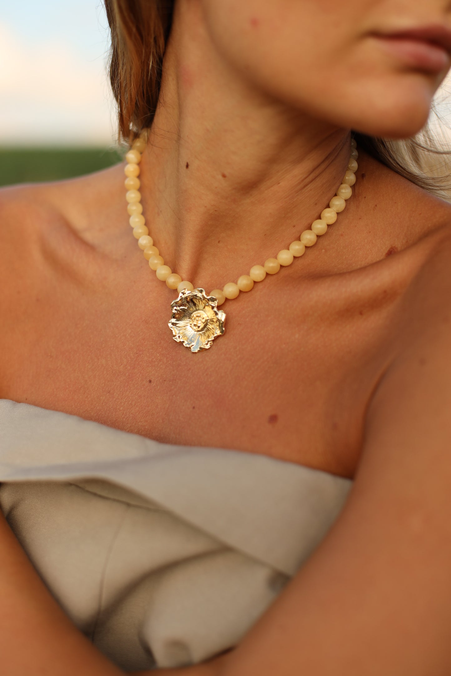 Calcite Stones and Gold Plated Flower Necklace