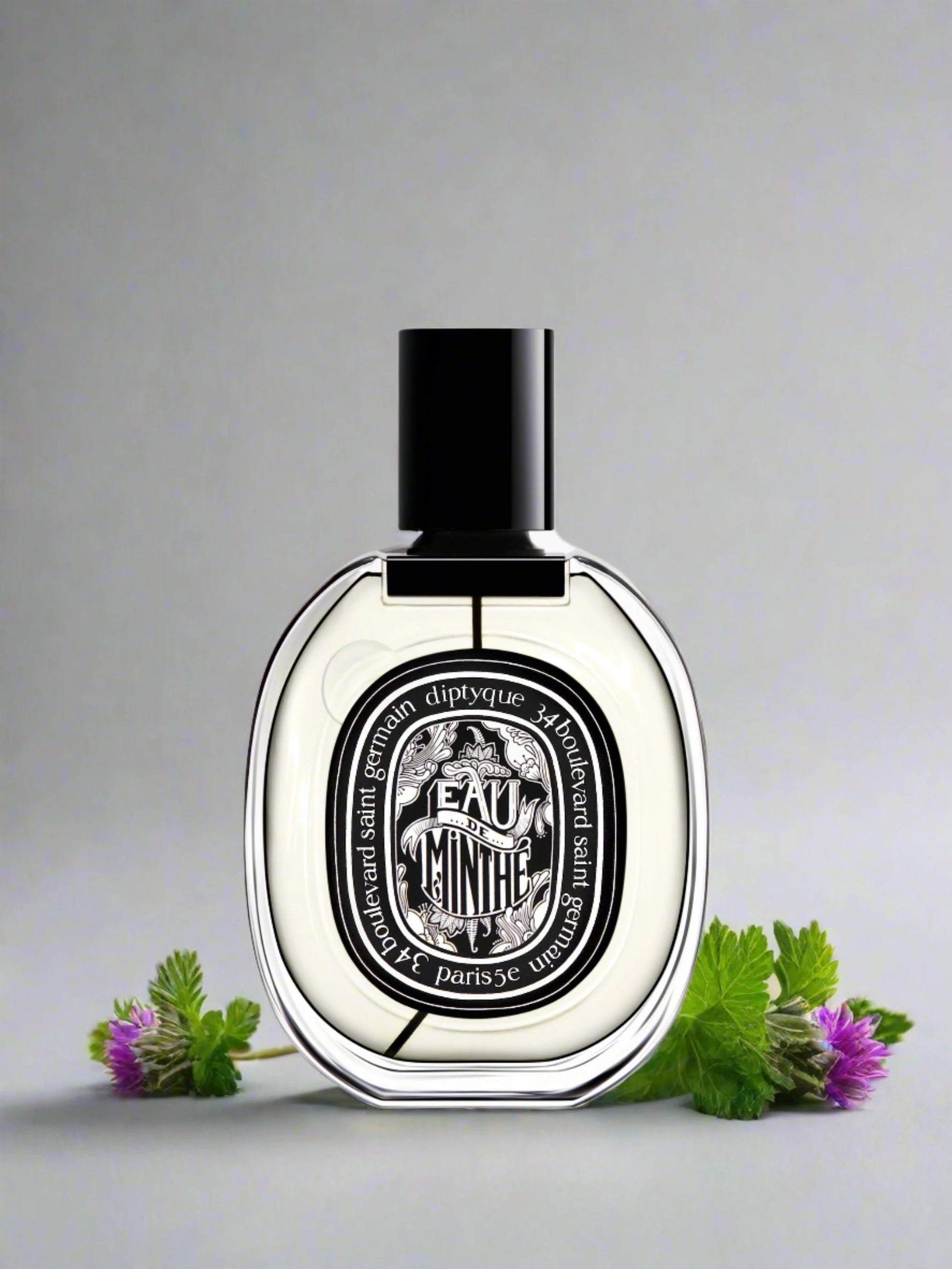 Women's Perfume Diptyque EDP Eau de Minthé 75 ml a bottle with mint in the background