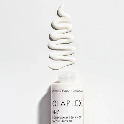 Olaplex N5 Bond Maintenance Conditioner 100 ml bottle and texture